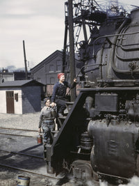 Railroad Workers Cleaning Locomotives in Clinton, Iowa - Fine Art Print by Jack Delano
