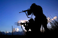 Air Force Security Forces Guarding Campsite Fine Art Print by Stocktrek Images
