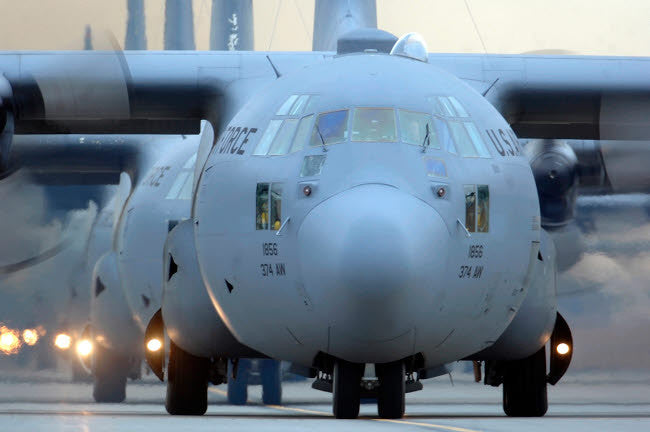 C-130 Hercules Aircraft Taxiing for Mission Fine Art Print by Stocktrek Images
