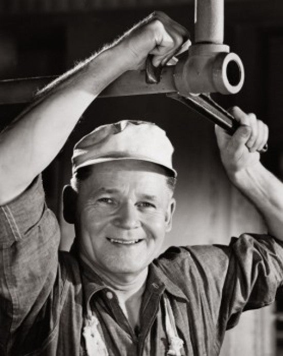 Portrait of a Plumber Repairing Pipeline Fine Art Print