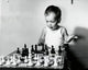 Close-up of a Boy Playing Chess Fine Art Print