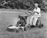 Mature Man Riding a Mower in a Garden Fine Art Print