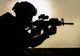 Silhouette of Young Soldier in Military Helmet Fine Art Print by Oleg Zabielin