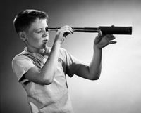 Boy Looking Through a Hand-Held Telescope Fine Art Print