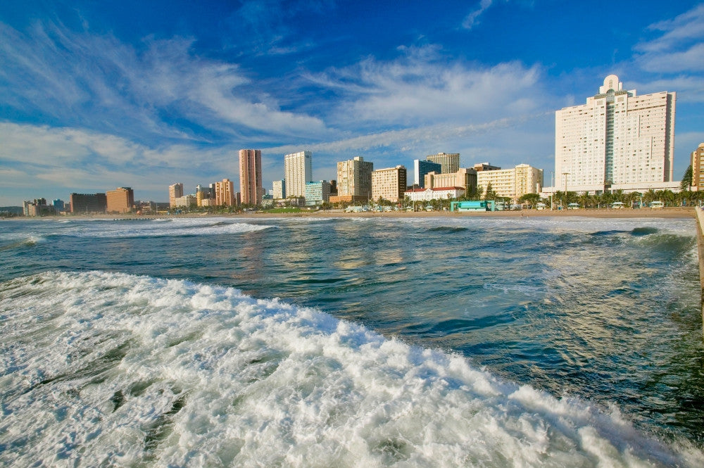 Ocean Wave Over Durban Skyline Poster Print by Panoramic Images