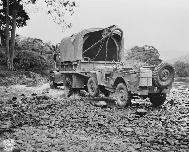 A US Military Truck with Wrecker Mount Towing a Jeep, 1942 Fine Art Print by Stocktrek Images