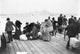 Ellis Island Immigrants on a Dock Photograph - Fine Art Print