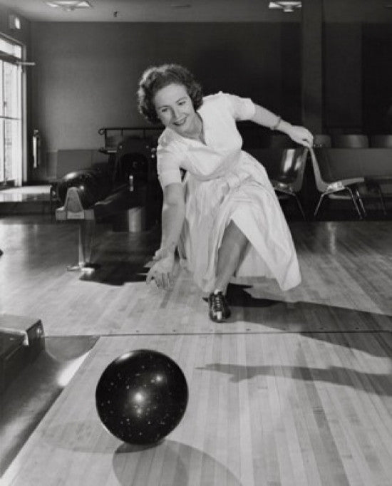 Mature Woman Bowling in an Alley Fine Art Print