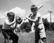 Two Boys Playing Baseball in Field Fine Art Print