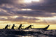 Outrigger Canoe and Paddlers at Sunset Fine Art Print by Vince Cavataio