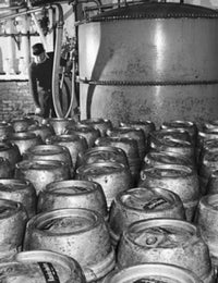 Male Worker Inspecting Barrels at Rupperts Brewery Fine Art Print