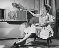 Young Woman Operating Air Conditioner Fine Art Print