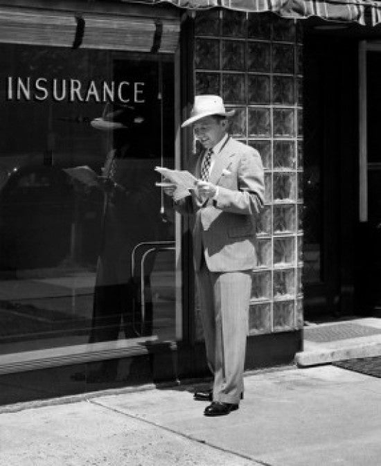 Man Holding Documents in Front of Insurance Company Fine Art Print