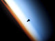 Silhouette of Space Shuttle Endeavour Over Earth's Horizon Poster Print