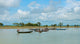 Fisherman on Kaladan River Fine Art Print | Posterazzi