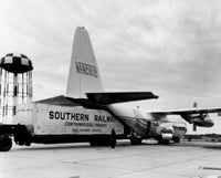 C-130 Hercules Airplane Carrying Railway Truck Fine Art Print
