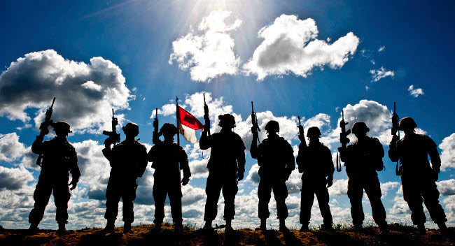 Silhouette of US Army National Guard Soldiers Fine Art Print by Stocktrek Images