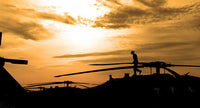 A Pilot Conducts a Pre-Flight Inspection on a UH-60 Black Hawk Helicopter Fine Art Print by Stocktrek Images