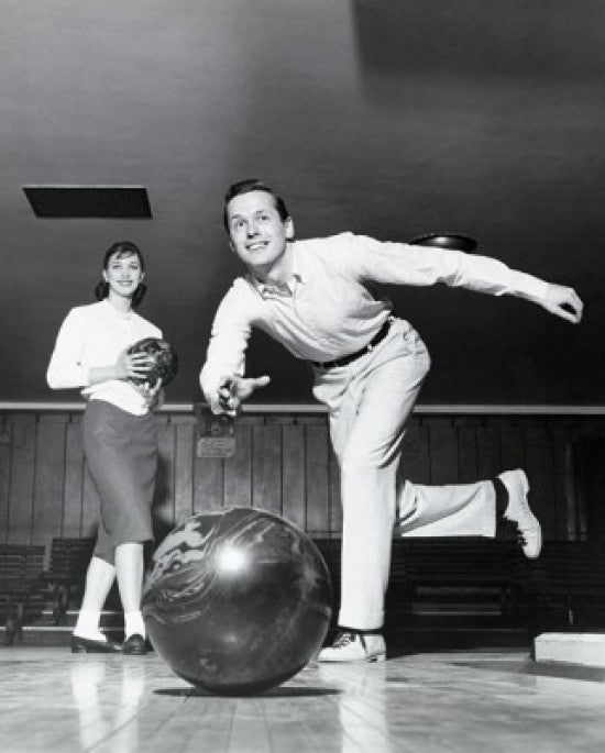 Young Man Bowling Fine Art Print with Woman in Alley