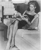Elizabeth Montgomery Reading on Couch Photo Print