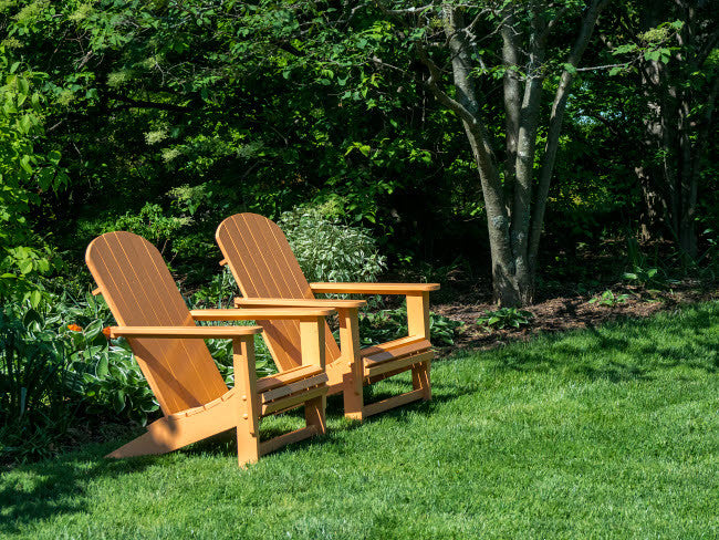 Pair of Adirondack Chairs in a Garden Fine Art Print by Julie Eggers