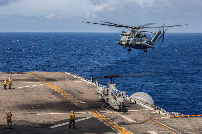 A CH-53E Super Stallion Approaches USS Bonhomme Richard Fine Art Print by Stocktrek Images