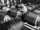 Manual Worker with Compressor Rotors in Jet Engine Factory Fine Art Print