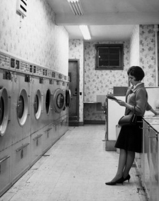 Side Profile of Young Woman in Laundromat Fine Art Print