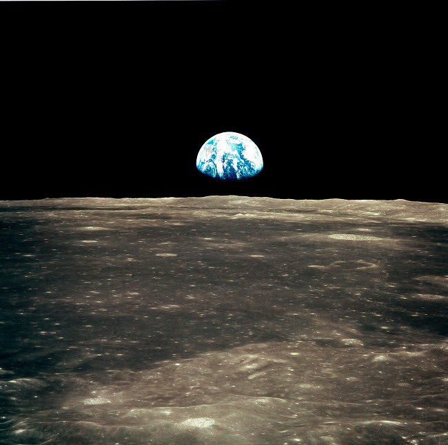 Earth Rising Above the Moon's Horizon Fine Art Print by Stocktrek Images