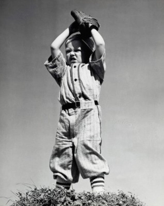 Low Angle View of a Boy Playing Baseball Fine Art Print