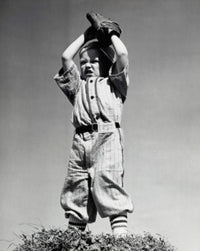 Low Angle View of a Boy Playing Baseball Fine Art Print