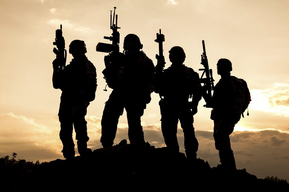 Silhouette of United States Army Rangers at Sunset Fine Art Print by Oleg Zabielin