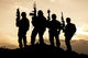 Silhouette of United States Army Rangers at Sunset Fine Art Print by Oleg Zabielin