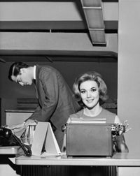 Young Woman Typing on a Typewriter – Fine Art Print