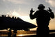 F-14 Tomcat Poster Print Featuring Aircraft Handling Petty Officer by Stocktrek Images