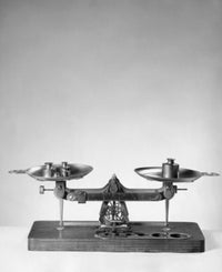 Weights on a Weighing Scale Fine Art Print