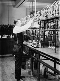 Whiskey Testing Photograph - 1920 IRS Chemist Print by Granger Collection