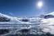 Bright Sun and Snow on Neko Harbour Poster Print by Deb Garside