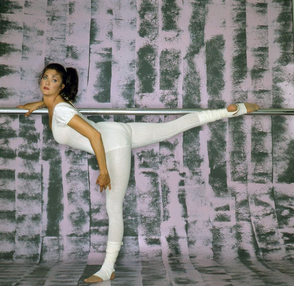 Lynda Carter 'Leg on Poll in White Unitard' Photo Print