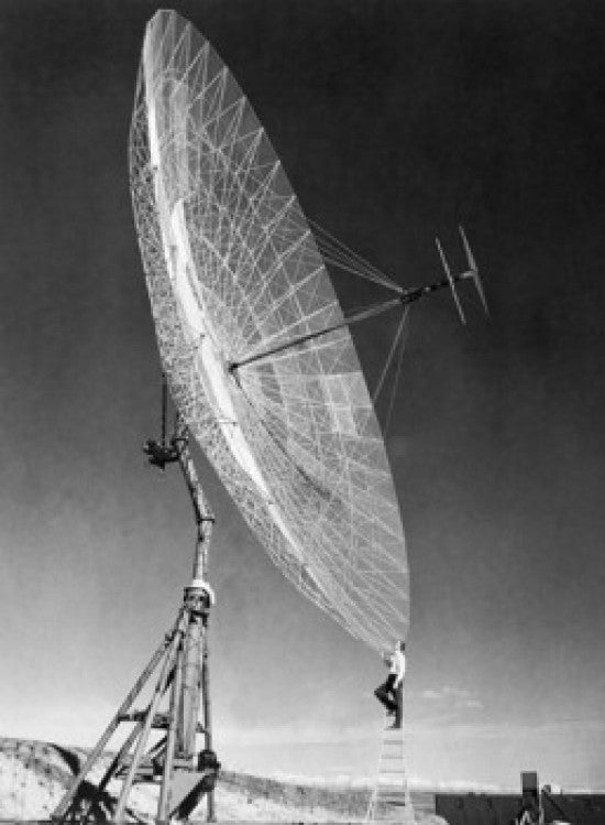 Engineer Standing on Ladder in Front of Parabolic Antenna Poster Print