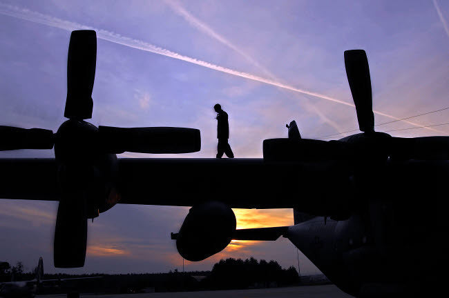 Airman Pre-Flight Inspection on C-130 Hercules Fine Art Print by Stocktrek Images