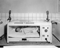 Baby Sleeping in an Incubator Fine Art Print