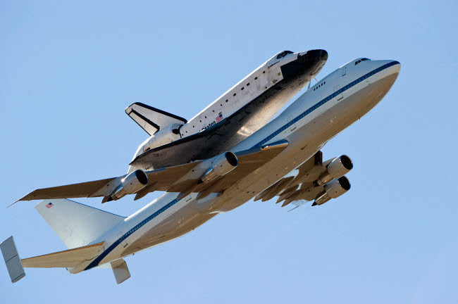 Space Shuttle Endeavour on Boeing 747 Carrier Aircraft Poster Print by Stocktrek Images