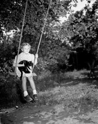Girl Swinging with Black Cat Fine Art Print