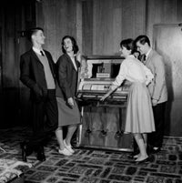 Two Young Couples Enjoying Music from Jukebox Fine Art Print