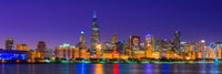 Chicago Skyline at Night with Cubs World Series Lights Poster Print by Panoramic Images