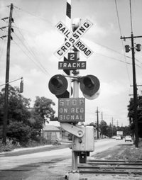 Railroad Crossing Sign at a Railroad Track Fine Art Print