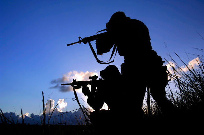 Air Force Security Forces Guarding Campsite Fine Art Print by Stocktrek Images