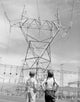 Boy and Girl Gazing at Electricity Pylon Fine Art Print