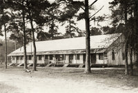Hine: Housing, 1911 - Photograph of Peerless Oyster Co. Camp